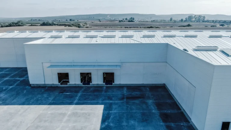 Aerial view of industrial steel building complex